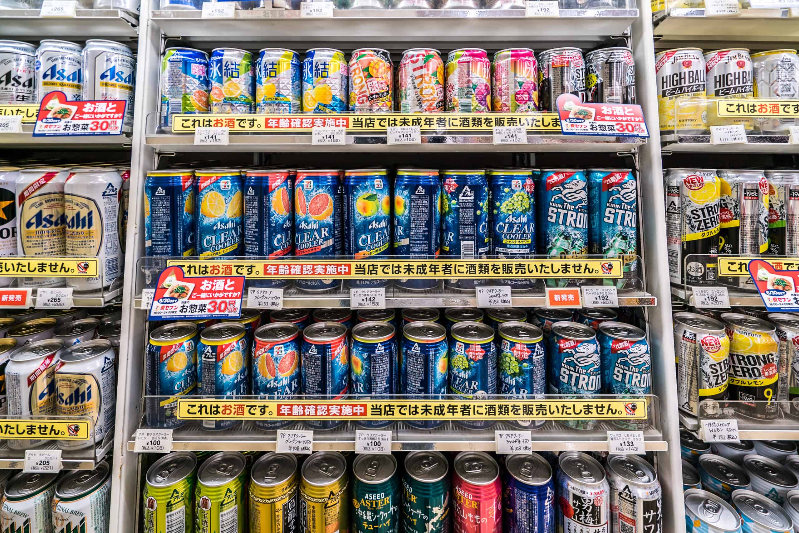 Variety of drinks on shelves in convenience store in Tokyo, Japan.
