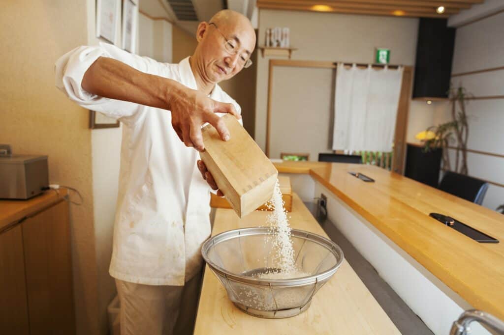 Itamae, sushi chef preparing rice